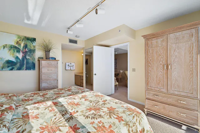 a bathroom with a shower and a sink