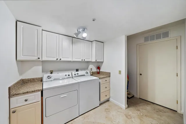 a view of a lake with a city