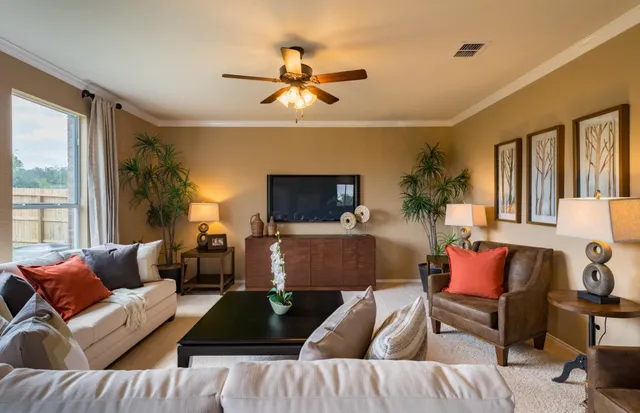 a living room with furniture and a window
