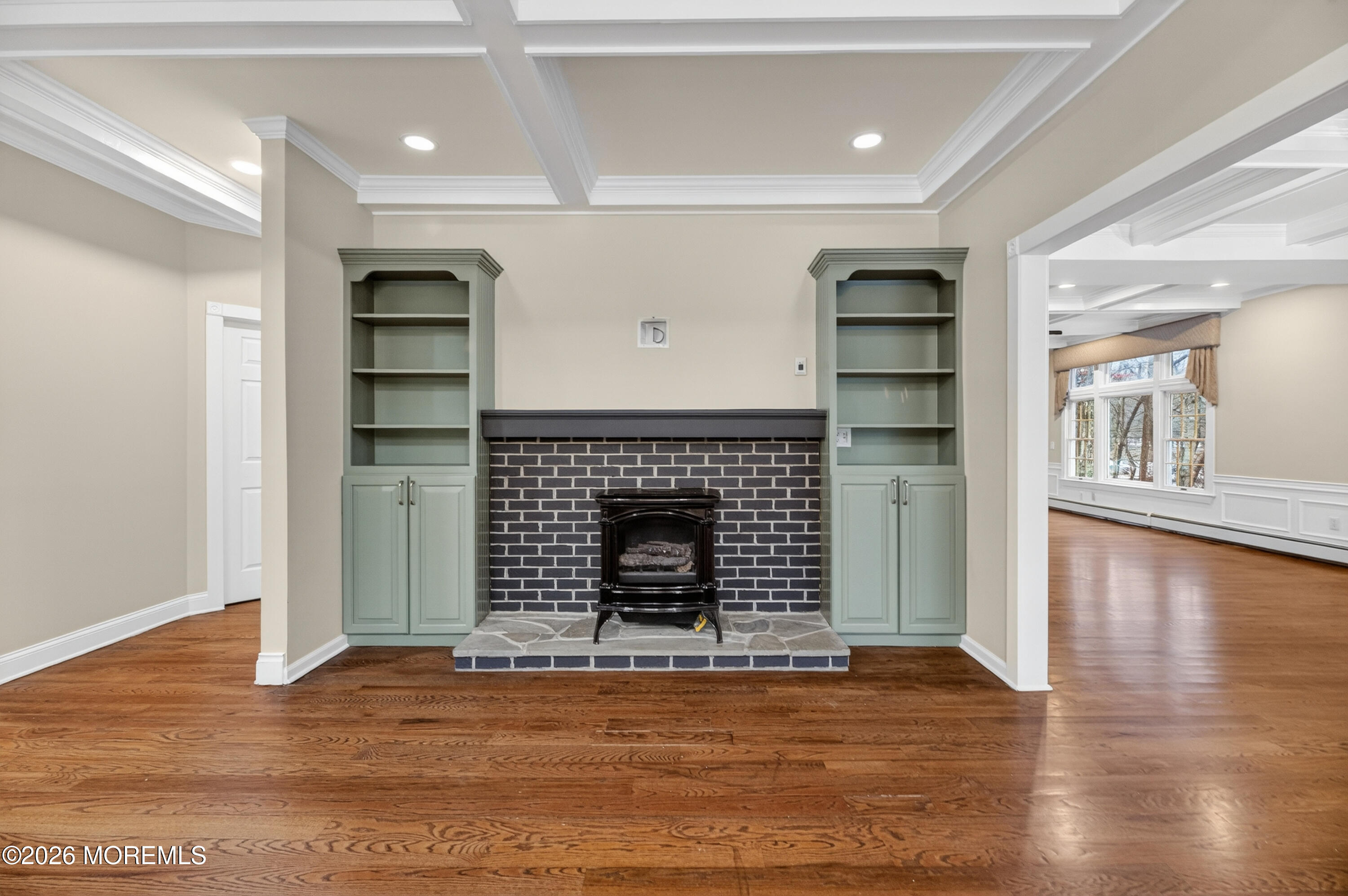 27 Carrs Tavern Road Millstone Township, NJ 08510 - Photo 15 of 78 a living room with a fireplace and wooden floor