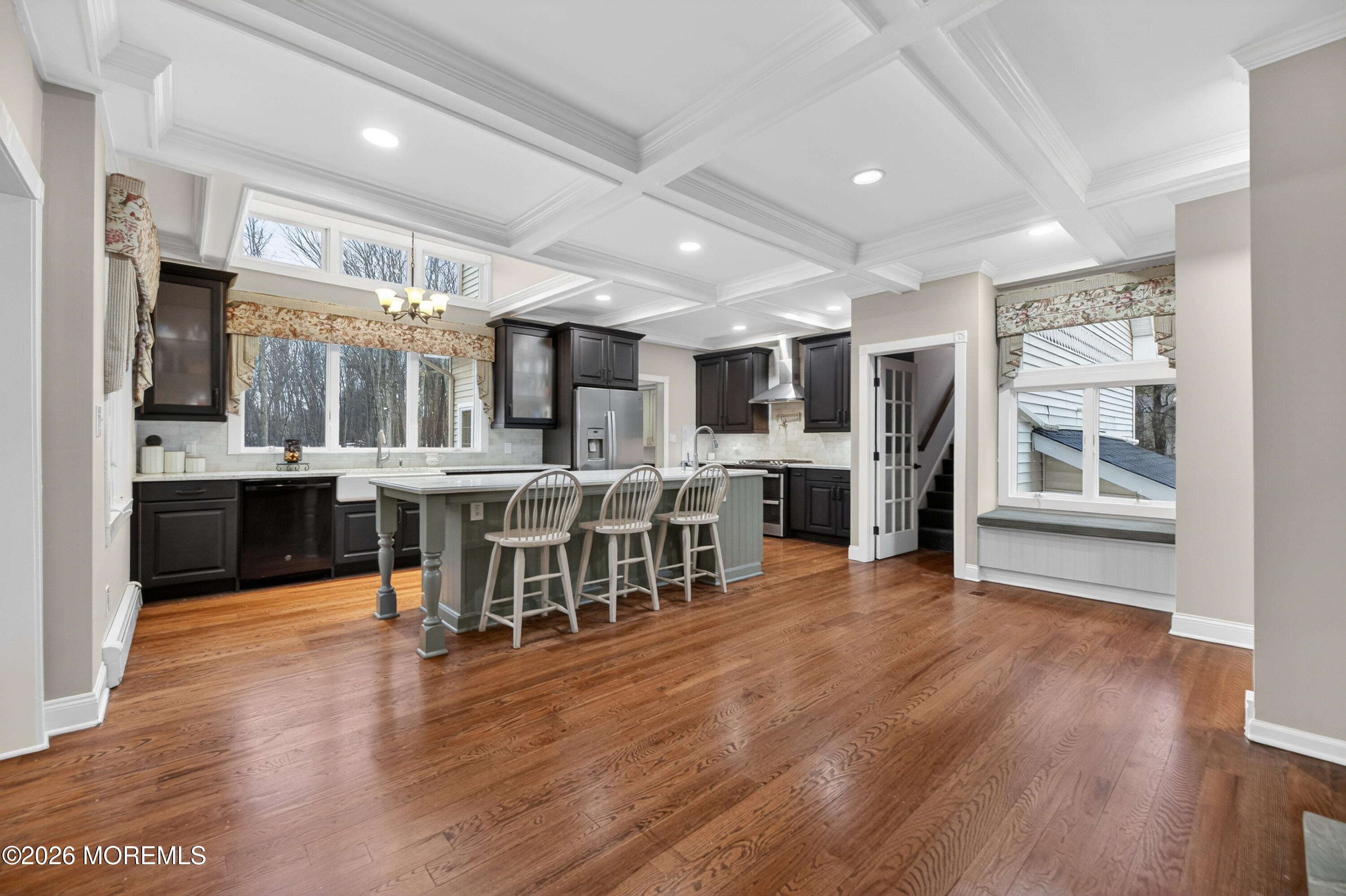 27 Carrs Tavern Road Millstone Township, NJ 08510 - Photo 16 of 78 a large white kitchen with lots of counter space and stainless steel appliances