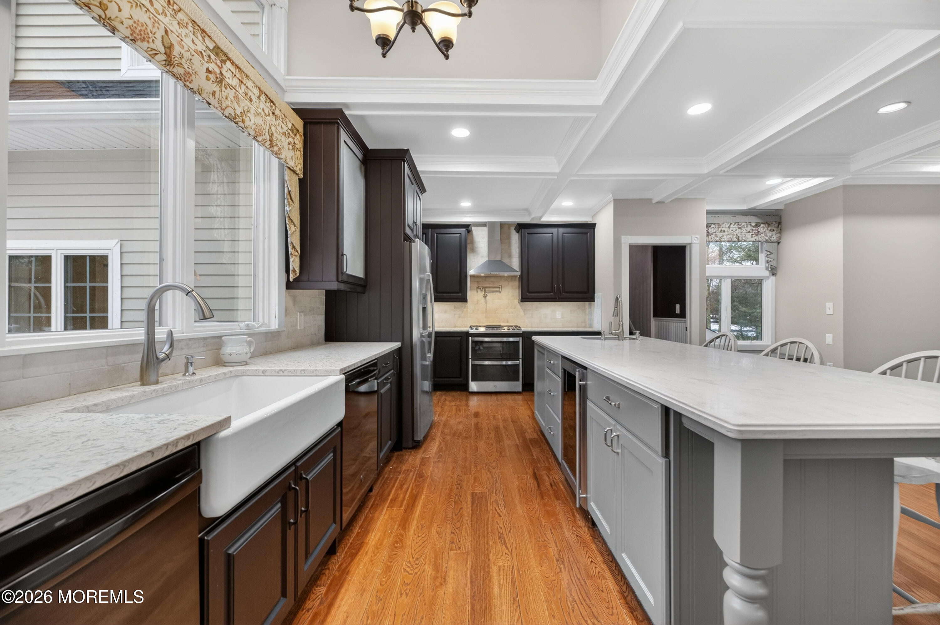 27 Carrs Tavern Road Millstone Township, NJ 08510 - Photo 20 of 78 a large kitchen with stainless steel appliances granite countertop a lot of counter space and wooden floor