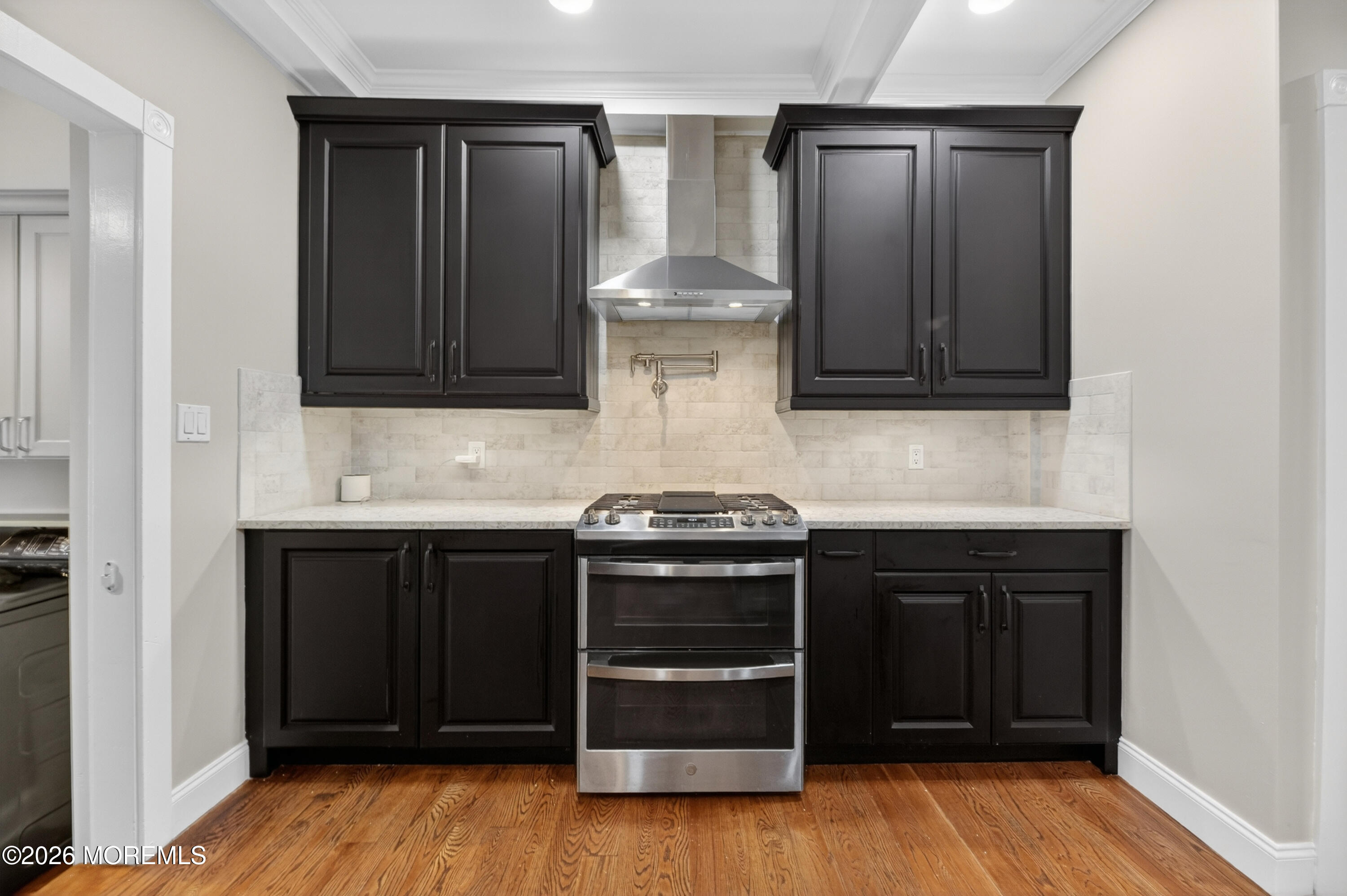 27 Carrs Tavern Road Millstone Township, NJ 08510 - Photo 21 of 78 a kitchen with granite countertop wood cabinets and stainless steel appliances