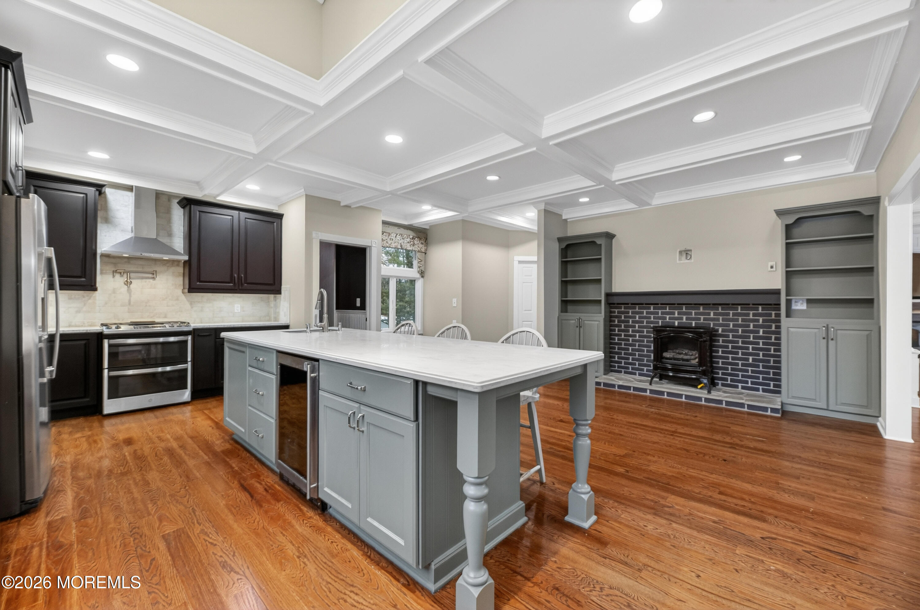 27 Carrs Tavern Road Millstone Township, NJ 08510 - Photo 22 of 78 a large kitchen with stainless steel appliances granite countertop a stove and a wooden floors