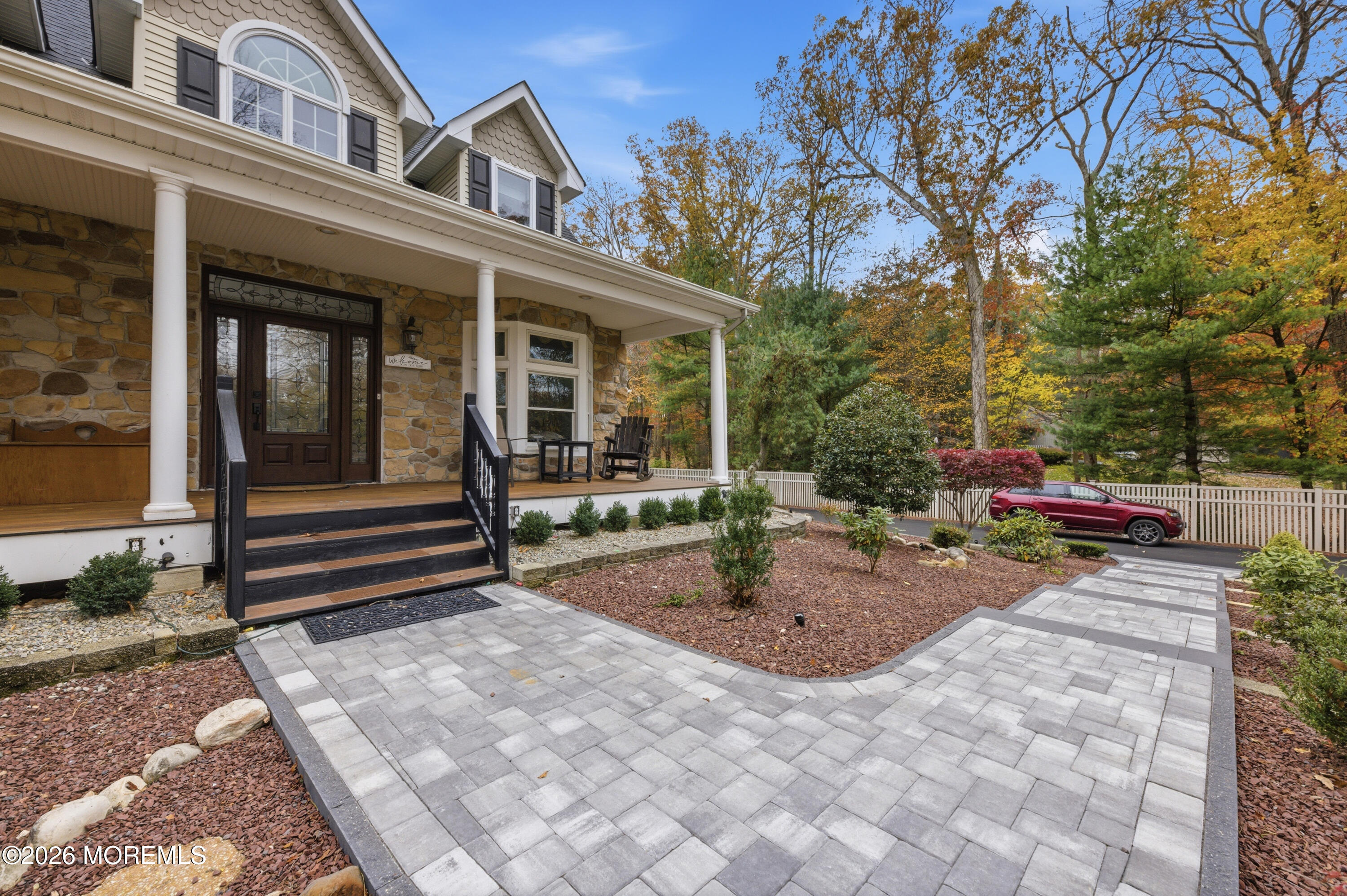 27 Carrs Tavern Road Millstone Township, NJ 08510 - Photo 3 of 78 a view of a house with backyard porch and sitting area