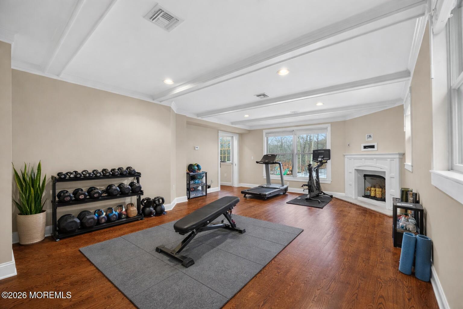 27 Carrs Tavern Road Millstone Township, NJ 08510 - Photo 36 of 78 a living room with furniture and a fireplace