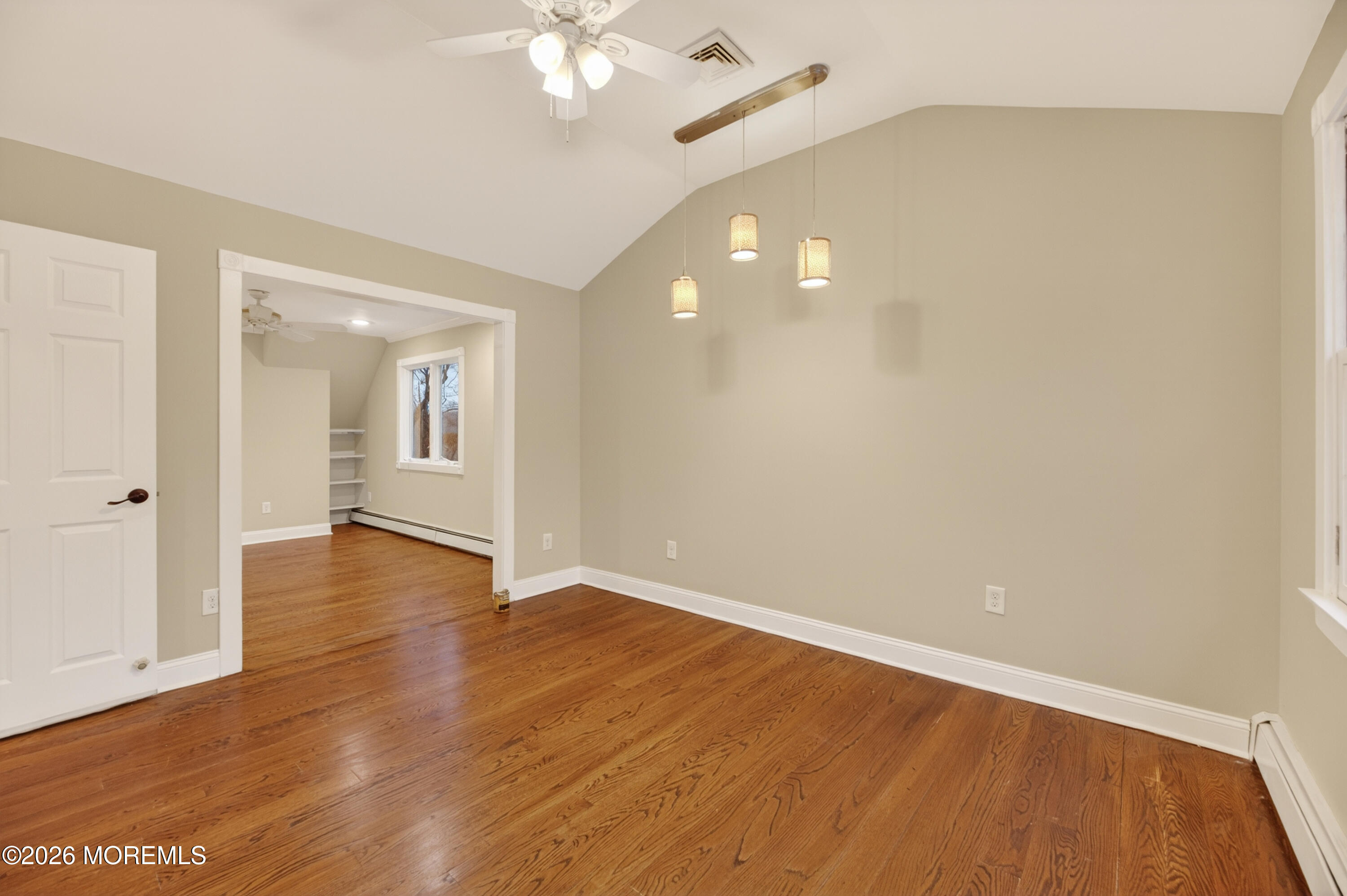 27 Carrs Tavern Road Millstone Township, NJ 08510 - Photo 49 of 78 wooden floor in an empty room with a window