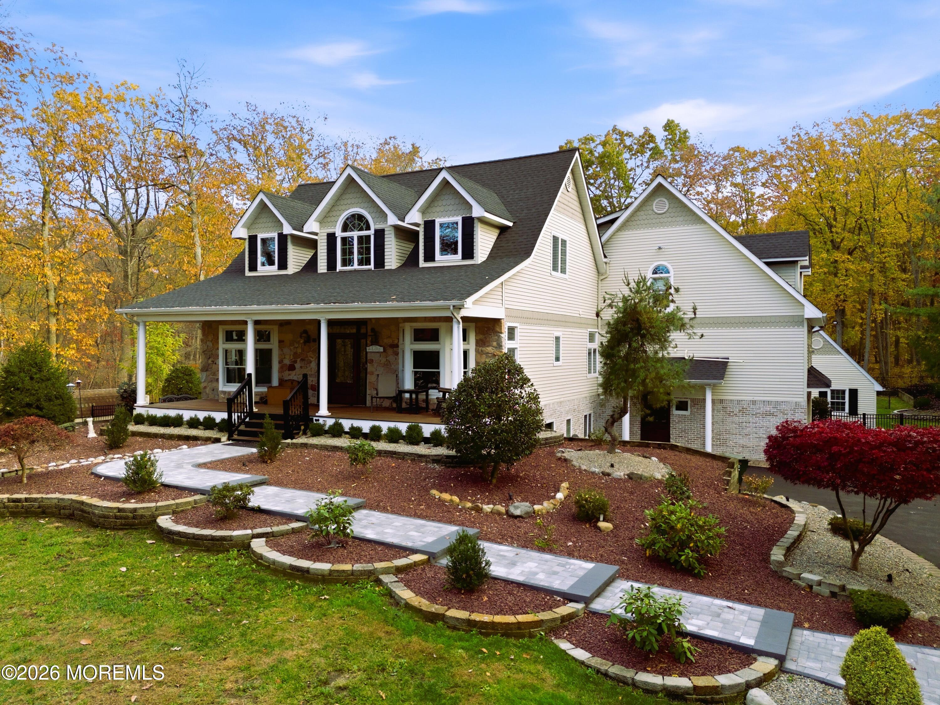 27 Carrs Tavern Road Millstone Township, NJ 08510 - Photo 68 of 78 a view of a house with swimming pool and sitting area