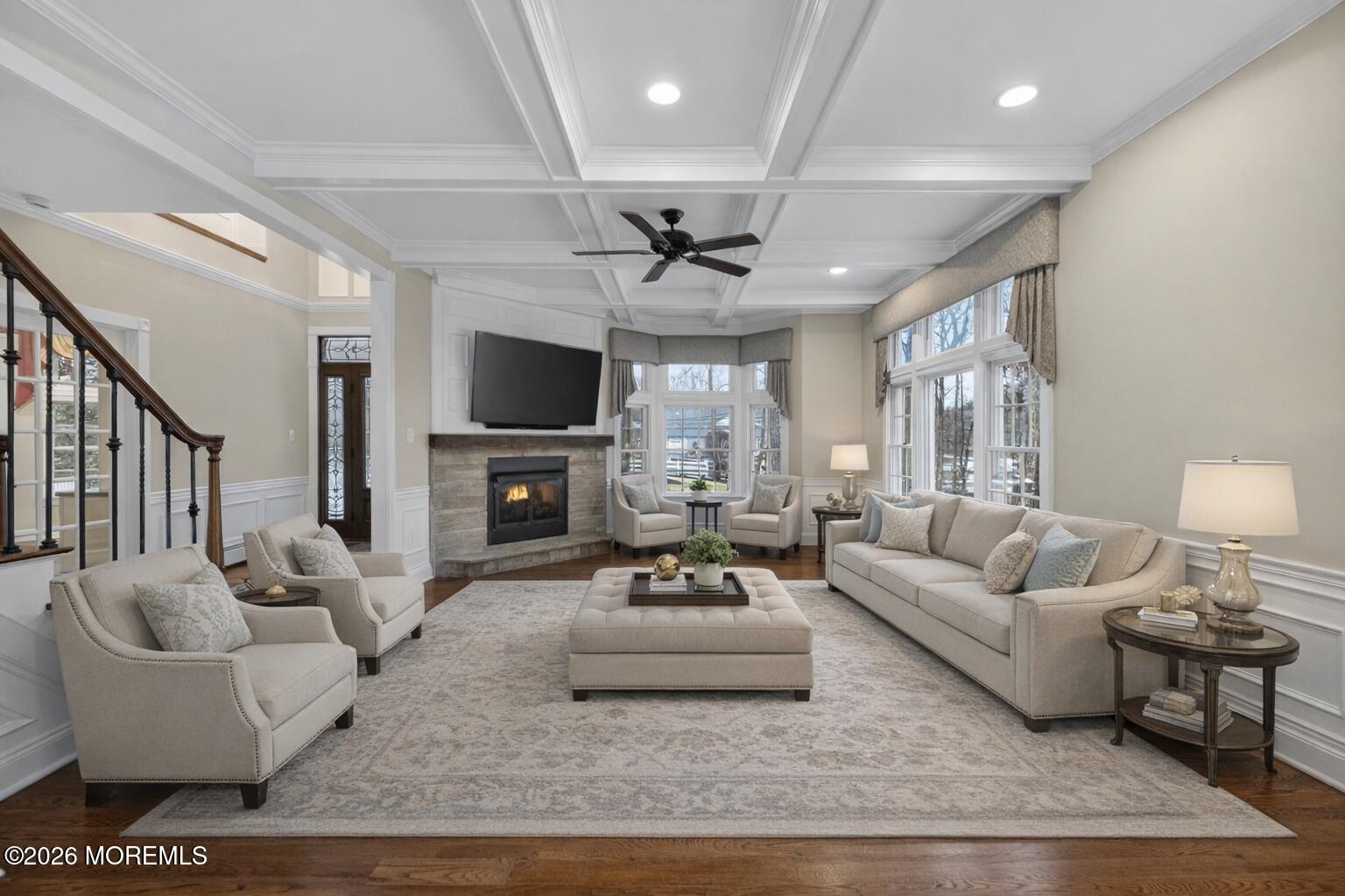 27 Carrs Tavern Road Millstone Township, NJ 08510 - Photo 8 of 78 a living room with furniture a fireplace and a flat screen tv