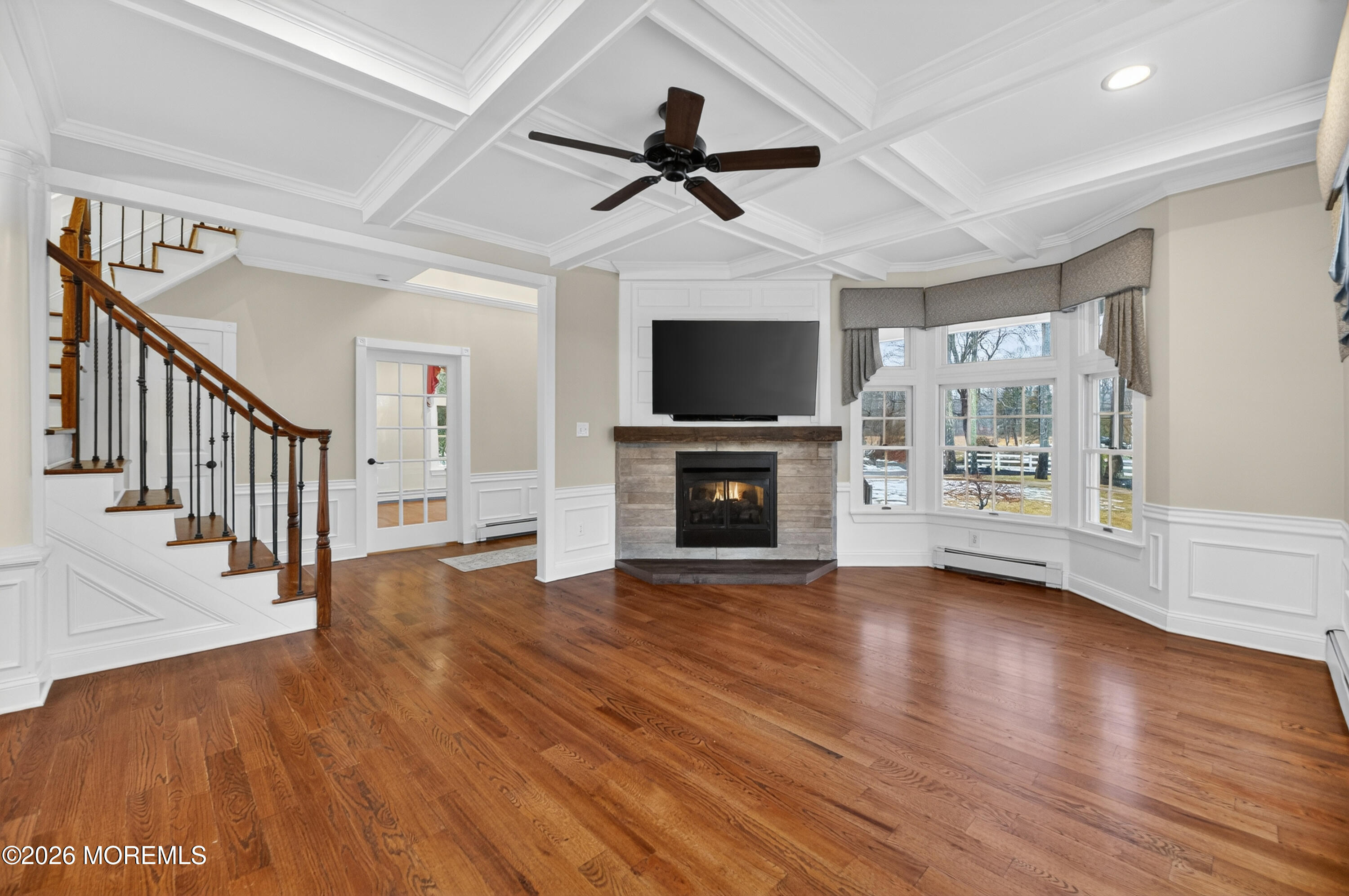 27 Carrs Tavern Road Millstone Township, NJ 08510 - Photo 9 of 78 a view of livingroom with hardwood floor and a ceiling fan