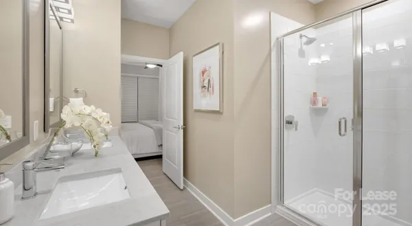 a bathroom with a sink and mirror