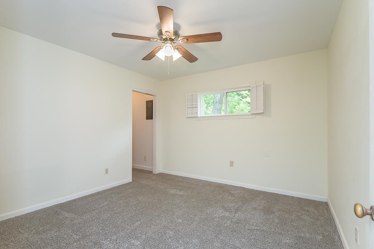 4934 Byron Road Memphis, TN 38122 - Photo 21 of 25 Carpeted empty room featuring ceiling fan