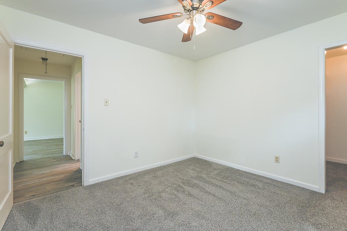 4934 Byron Road Memphis, TN 38122 - Photo 23 of 25 Carpeted empty room with ceiling fan