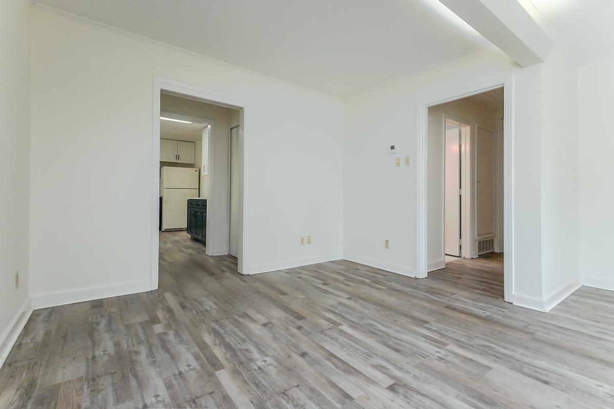 4934 Byron Road Memphis, TN 38122 - Photo 5 of 25 Empty room featuring wood-type flooring