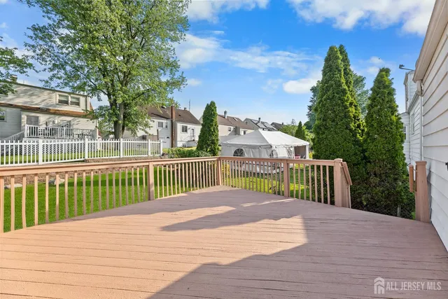 a view of a park with a large trees