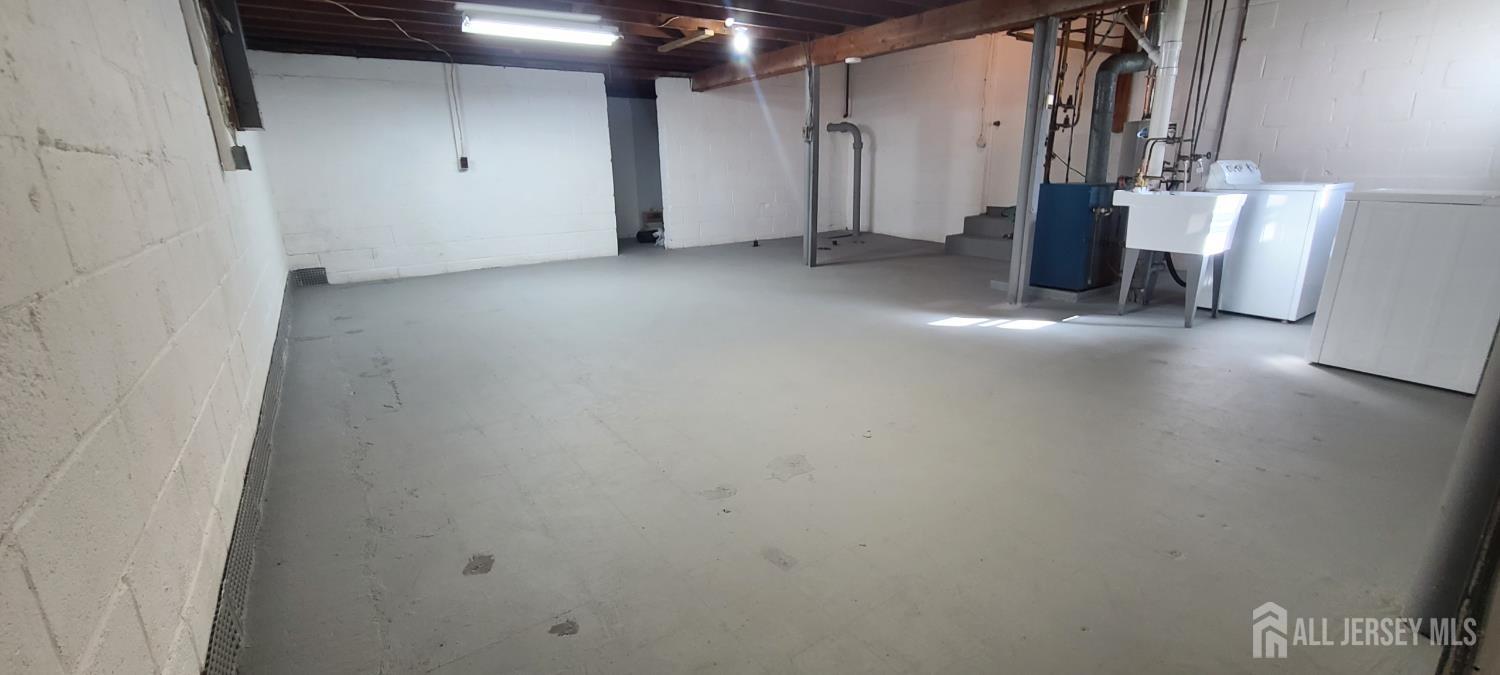 82 Mercer Street Menlo Park Terrace, NJ 08840 - Photo 23 of 31 a view of a storage & utility room