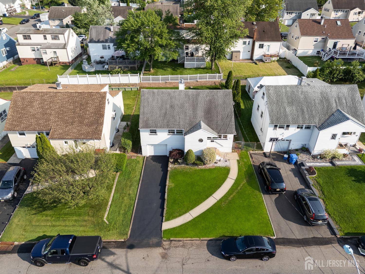 82 Mercer Street Menlo Park Terrace, NJ 08840 - Photo 28 of 31 an aerial view of a house with a garden and a car park