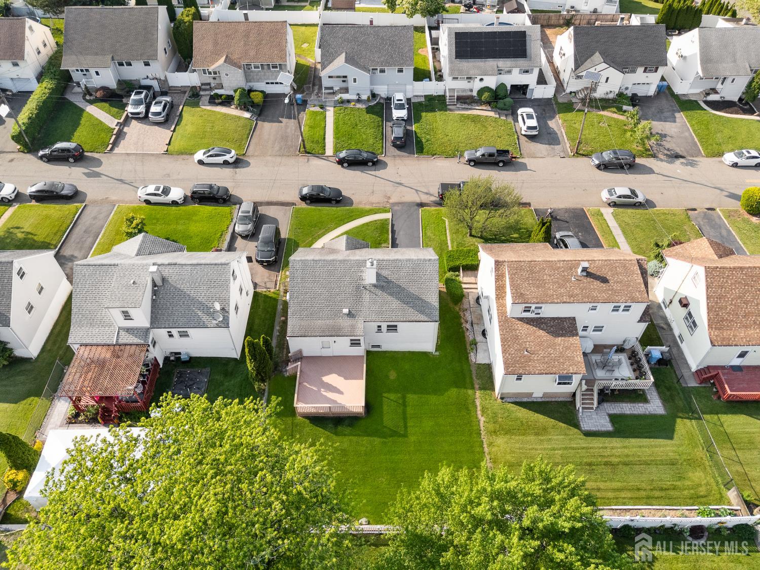 82 Mercer Street Menlo Park Terrace, NJ 08840 - Photo 30 of 31 an aerial view of residential houses with outdoor space and swimming pool