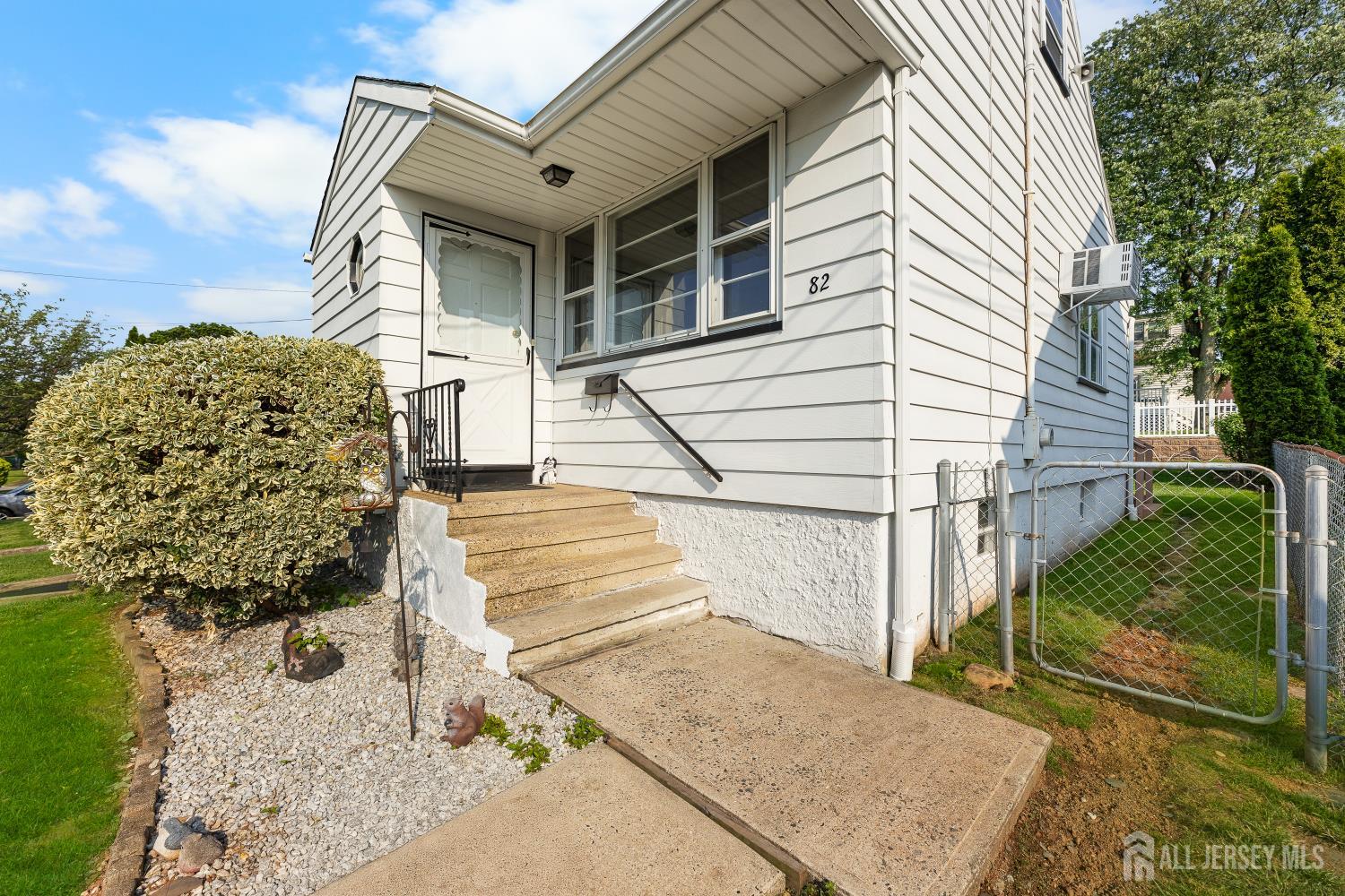 82 Mercer Street Menlo Park Terrace, NJ 08840 - Photo 4 of 31 a view of a house with a door and wooden floor