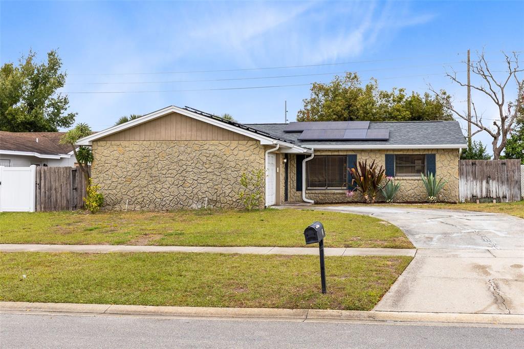 a front view of a house with swimming pool