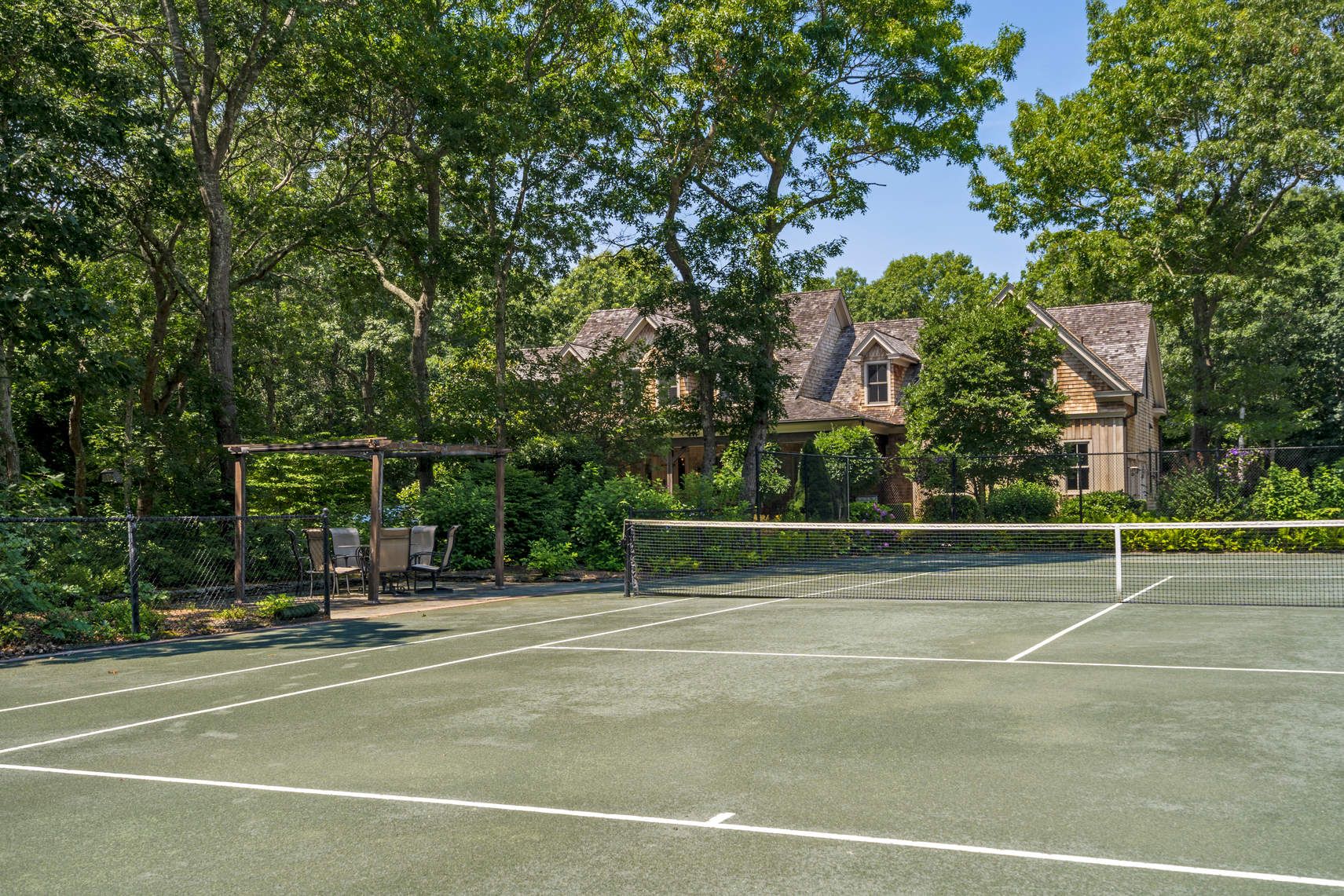 118 NW Path Sagaponack, NY 11962 - Photo 17 of 18 a view of a tennis court