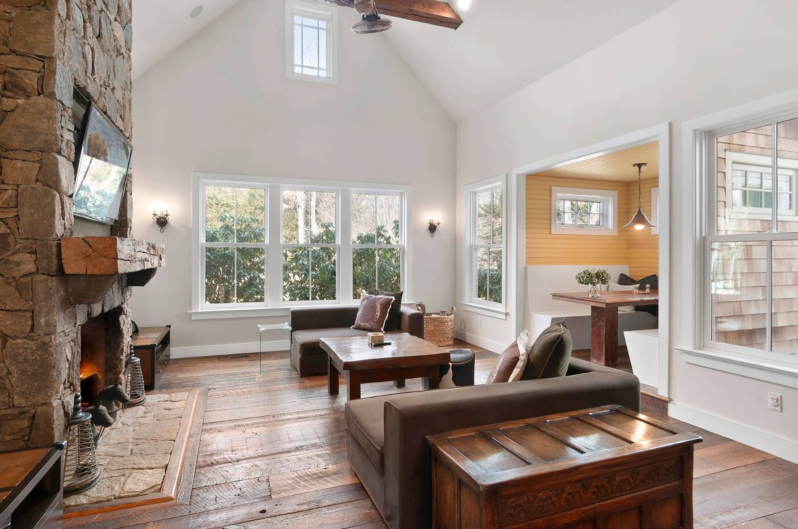 118 NW Path Sagaponack, NY 11962 - Photo 4 of 18 a living room with furniture and a fireplace