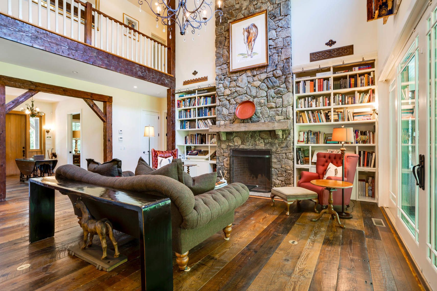 118 NW Path Sagaponack, NY 11962 - Photo 8 of 18 a living room with furniture a fireplace and wooden floor