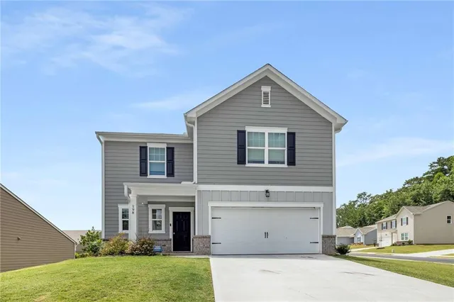 a front view of house with yard