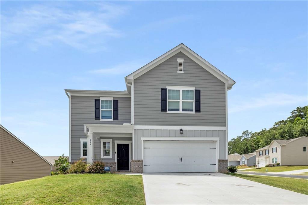 a front view of house with yard