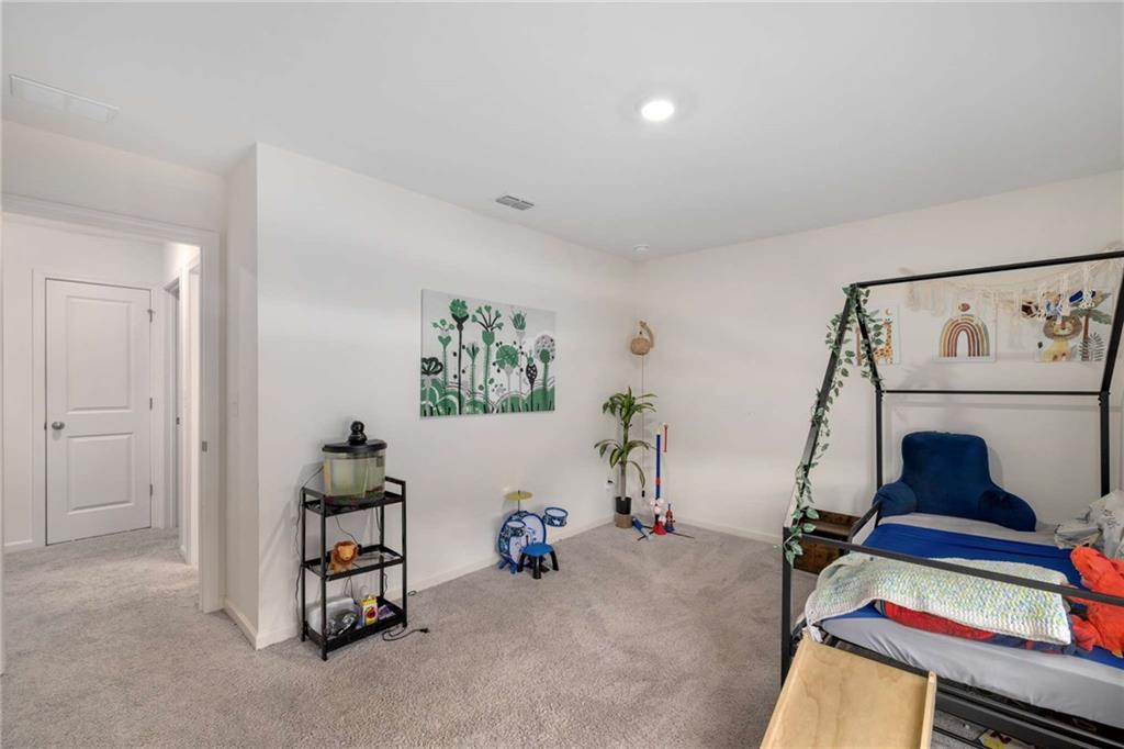 198 Colbury Street Villa Rica, GA 30180 - Photo 23 of 28 a room with furniture and white walls