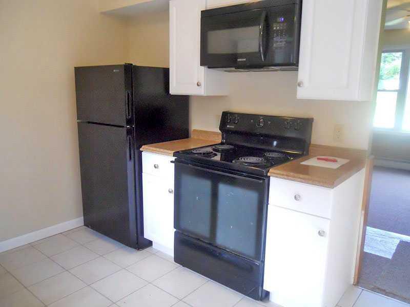 512 S Road Dixmont, ME 04932 - Photo 2 of 35 Kitchen. Sharp looking black appliances