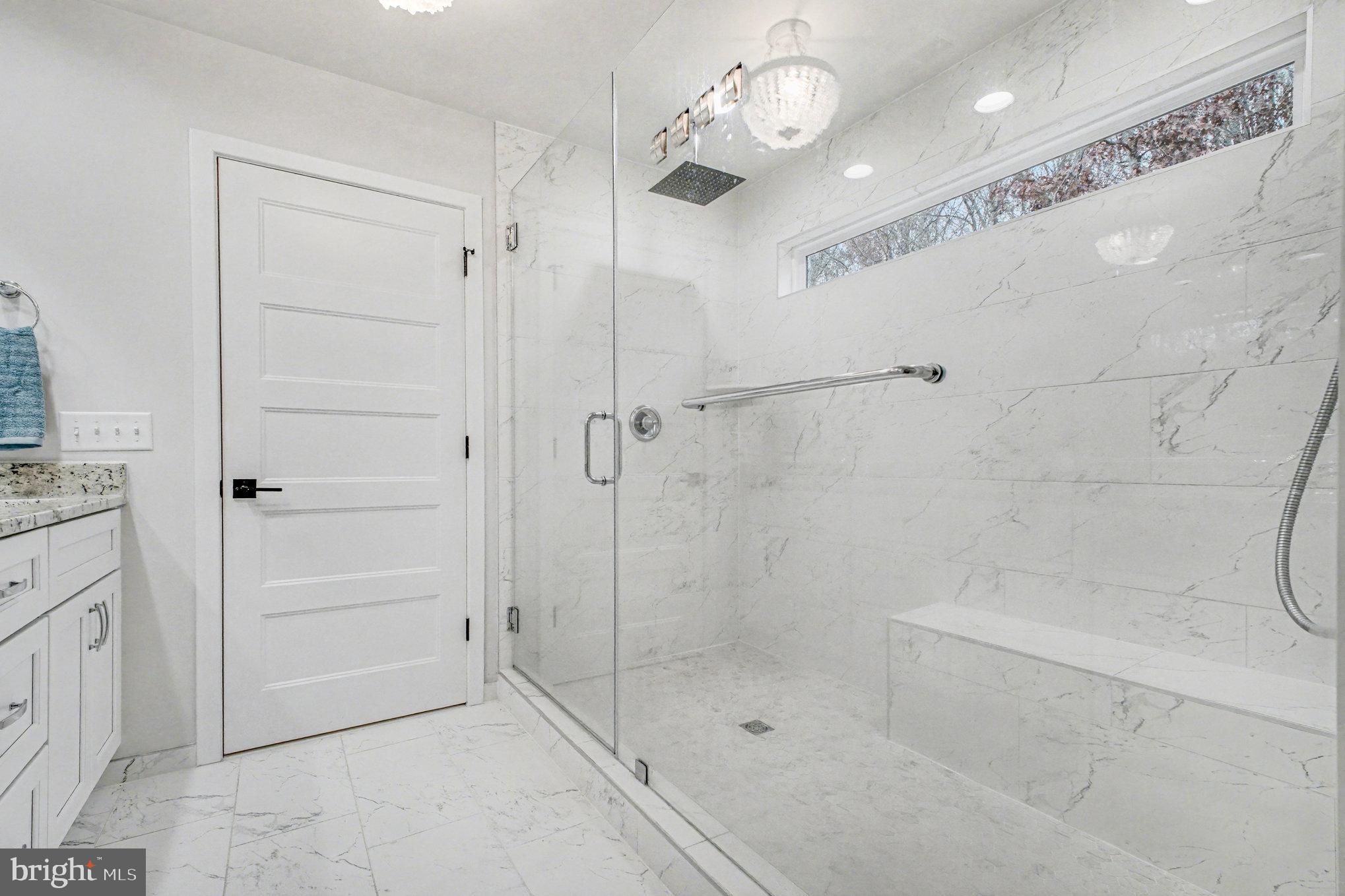 580 Kellogg Mill Road Fredericksburg, VA 22406 - Photo 18 of 41 a bathroom with a shower and a mirror