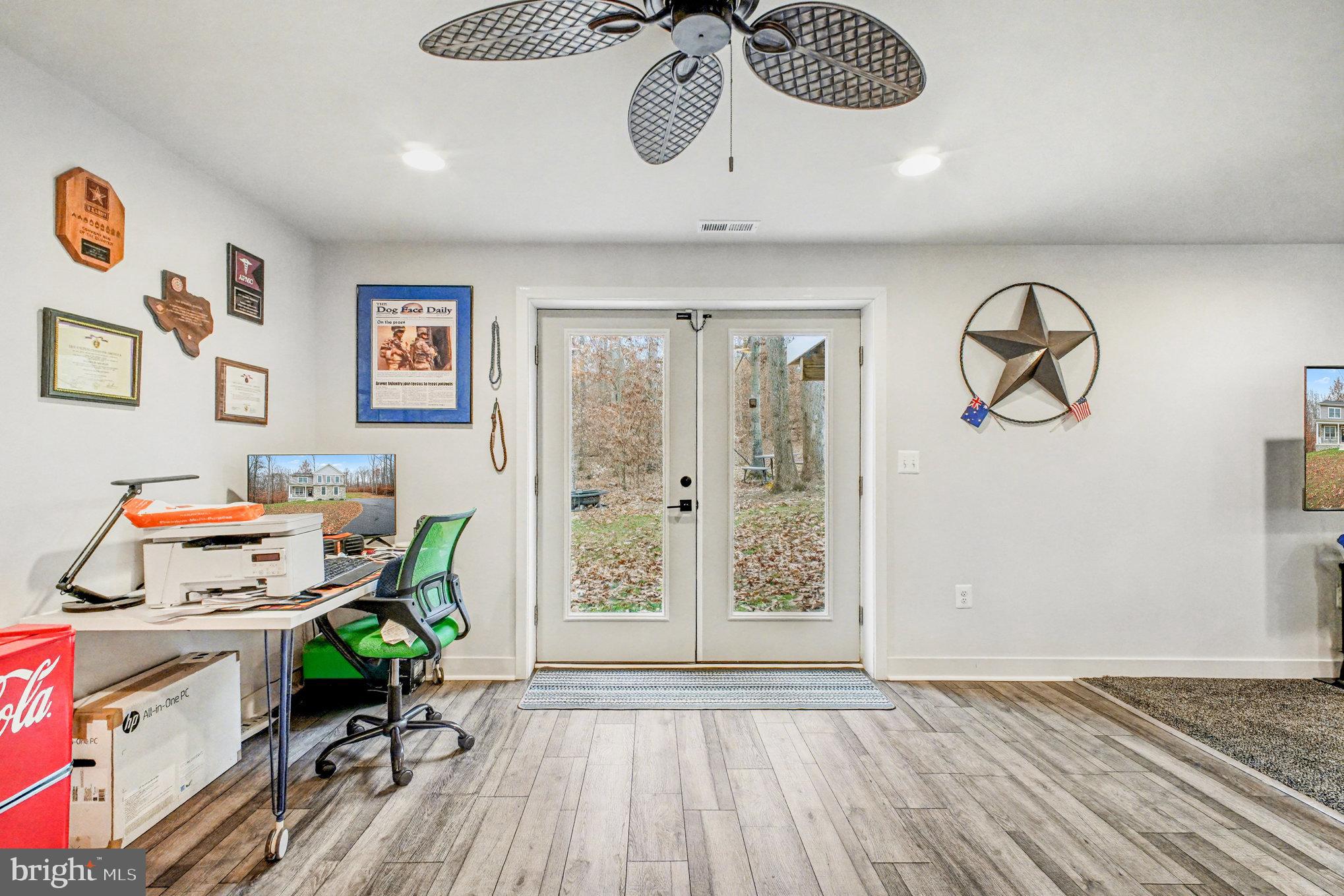 580 Kellogg Mill Road Fredericksburg, VA 22406 - Photo 27 of 41 a view of workspace with furniture and wooden floor