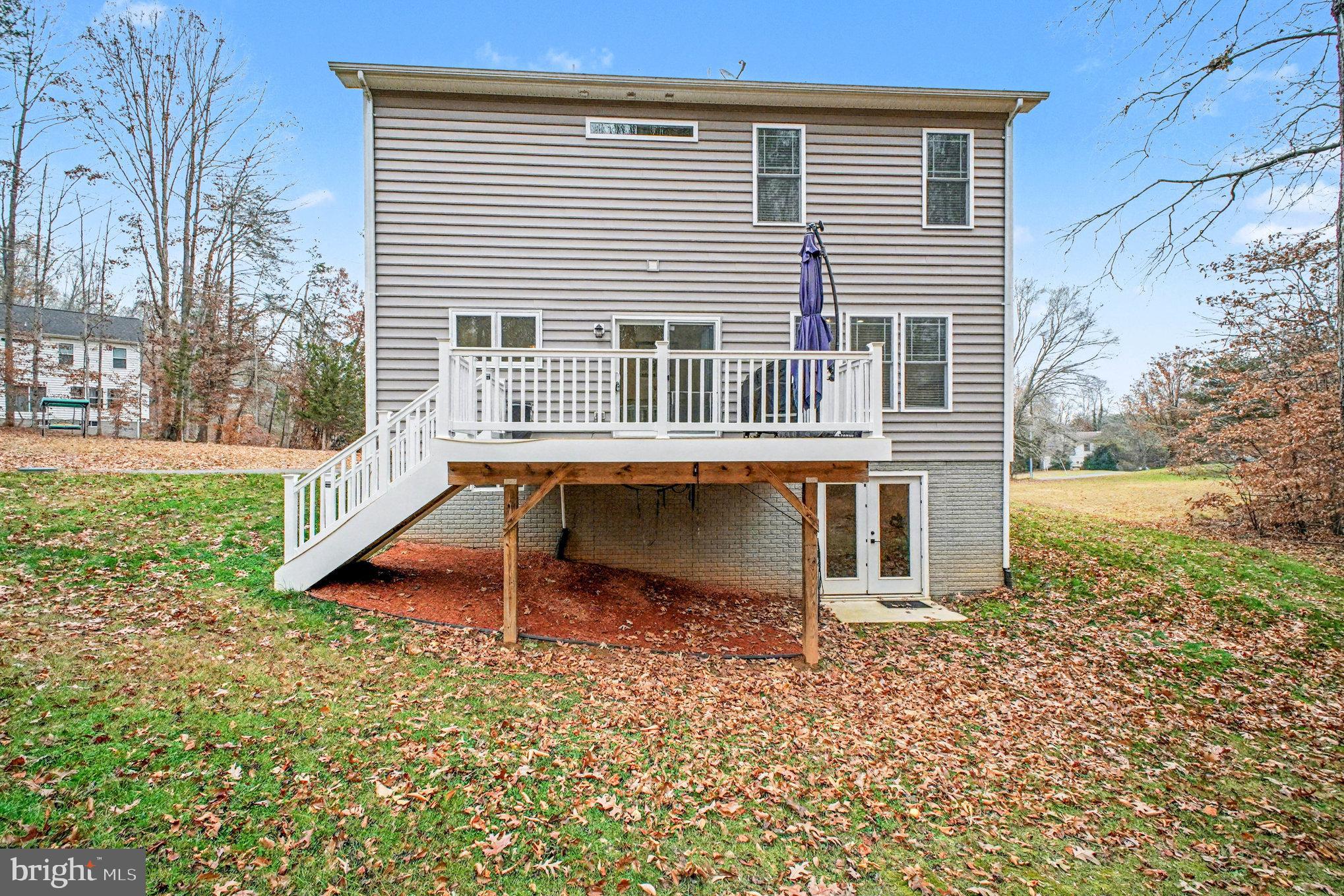 580 Kellogg Mill Road Fredericksburg, VA 22406 - Photo 32 of 41 front view of a house with a yard