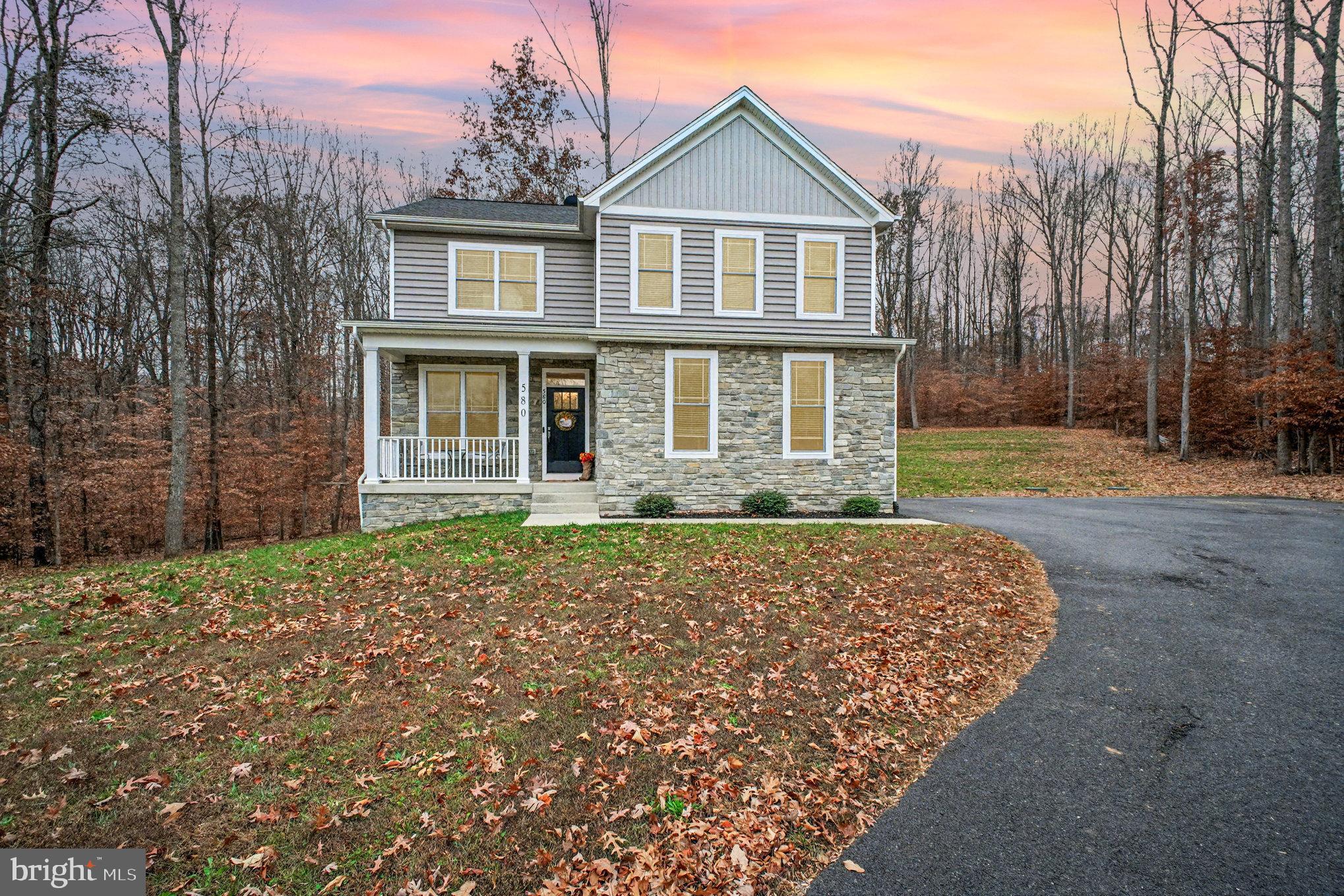 580 Kellogg Mill Road Fredericksburg, VA 22406 - Photo 36 of 41 front view of a house with a yard