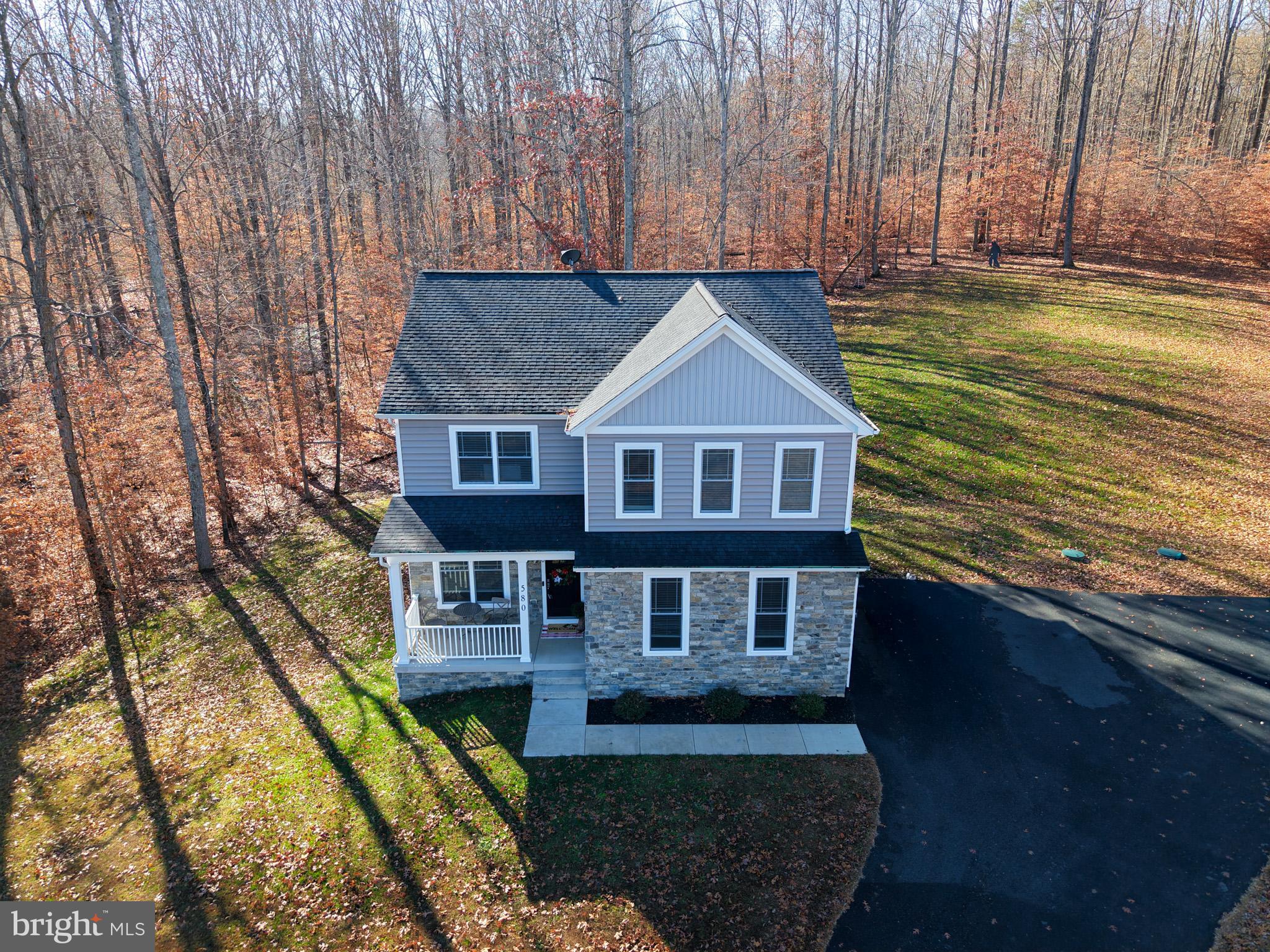 580 Kellogg Mill Road Fredericksburg, VA 22406 - Photo 41 of 41 a front view of a house with a yard