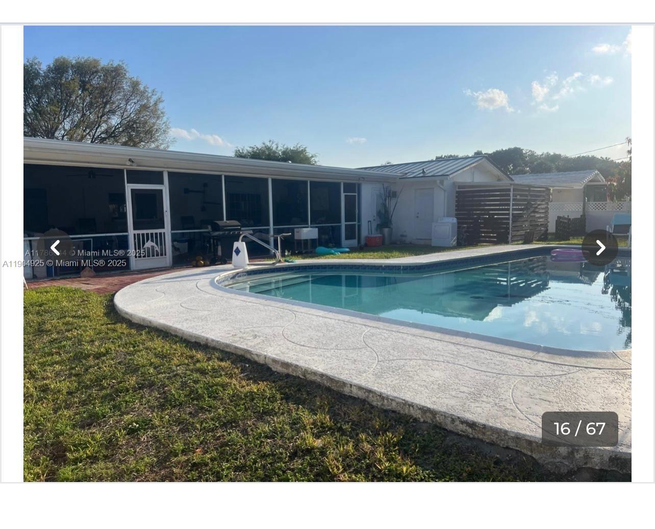 5001 Madison Street Hollywood, FL 33021 - Photo 4 of 23 a swimming pool with outdoor seating and yard