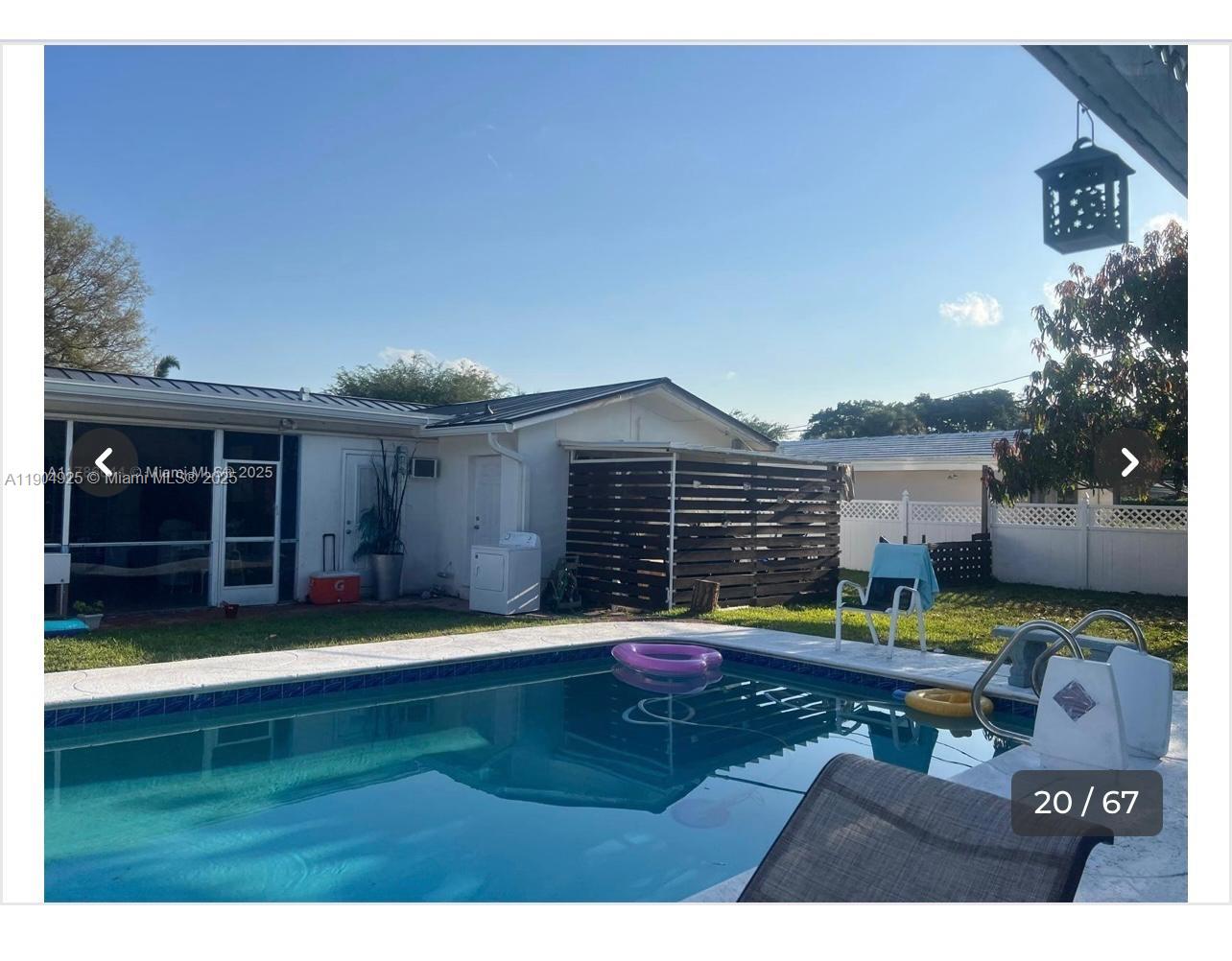5001 Madison Street Hollywood, FL 33021 - Photo 7 of 23 a backyard of a house with yard table and chairs