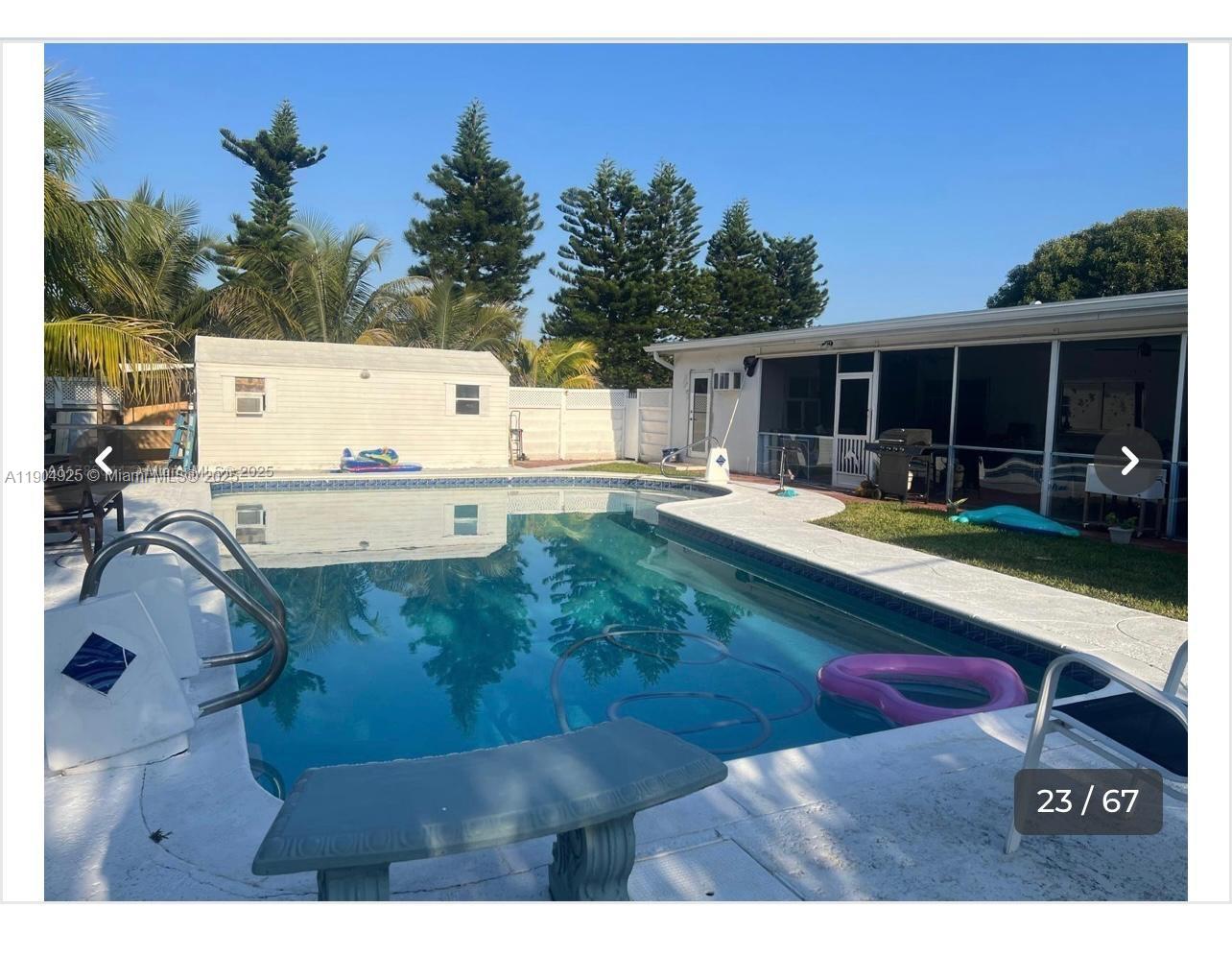 5001 Madison Street Hollywood, FL 33021 - Photo 10 of 23 a view of a backyard with a sitting area