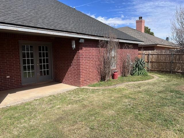 405 Sooner Street Wolfforth, TX 79382 - Photo 23 of 24 a front view of a house with a yard