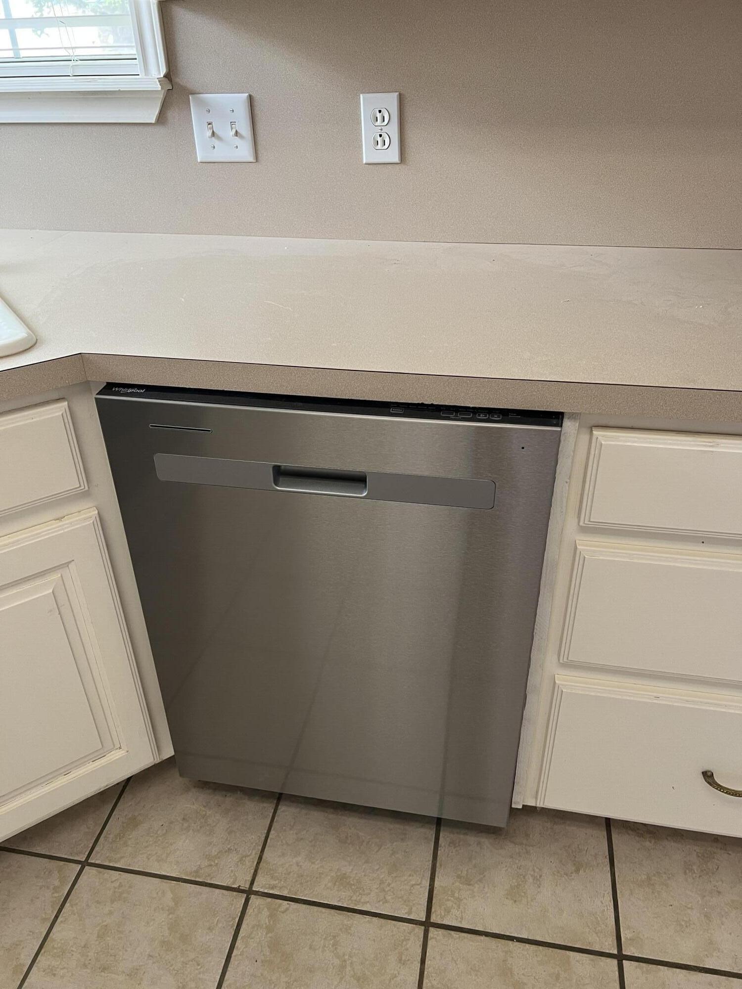 405 Sooner Street Wolfforth, TX 79382 - Photo 5 of 24 a close up view of a refrigerator