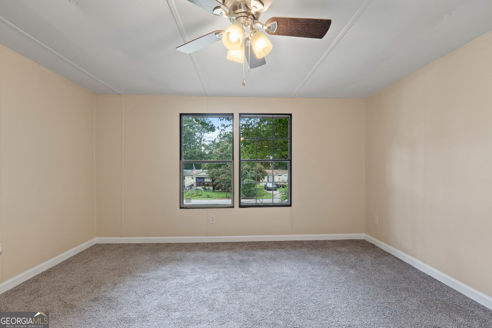 361 Hemlock Lane Locust Grove, GA 30248 - Photo 11 of 20 an empty room with a window