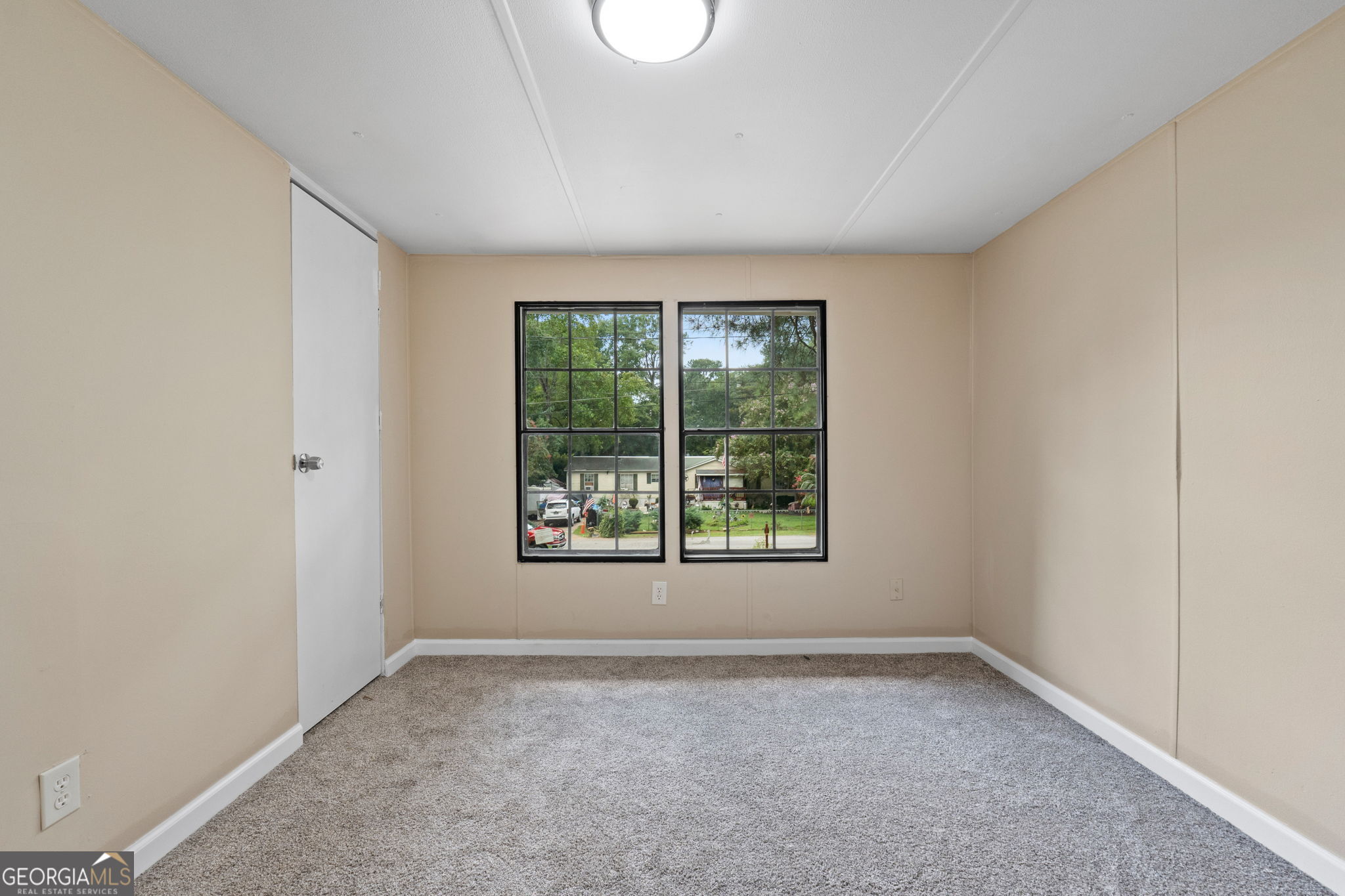 361 Hemlock Lane Locust Grove, GA 30248 - Photo 13 of 20 an empty room with a window