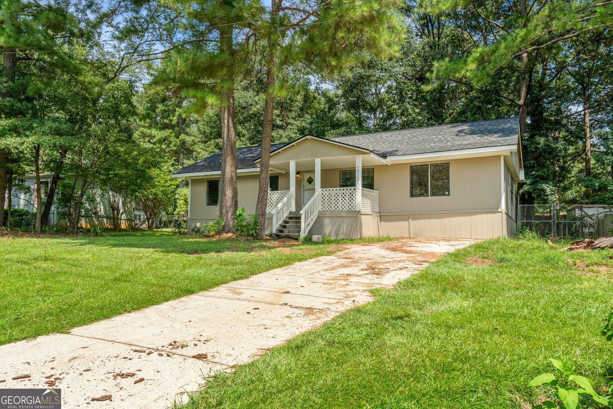 361 Hemlock Lane Locust Grove, GA 30248 - Photo 19 of 20 front view of a house with a yard
