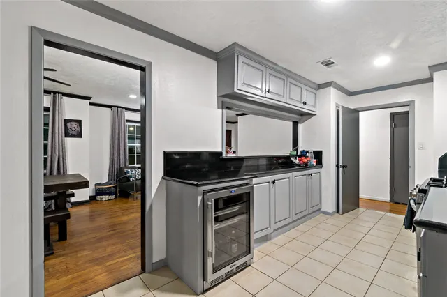 a kitchen with a sink cabinets and appliances