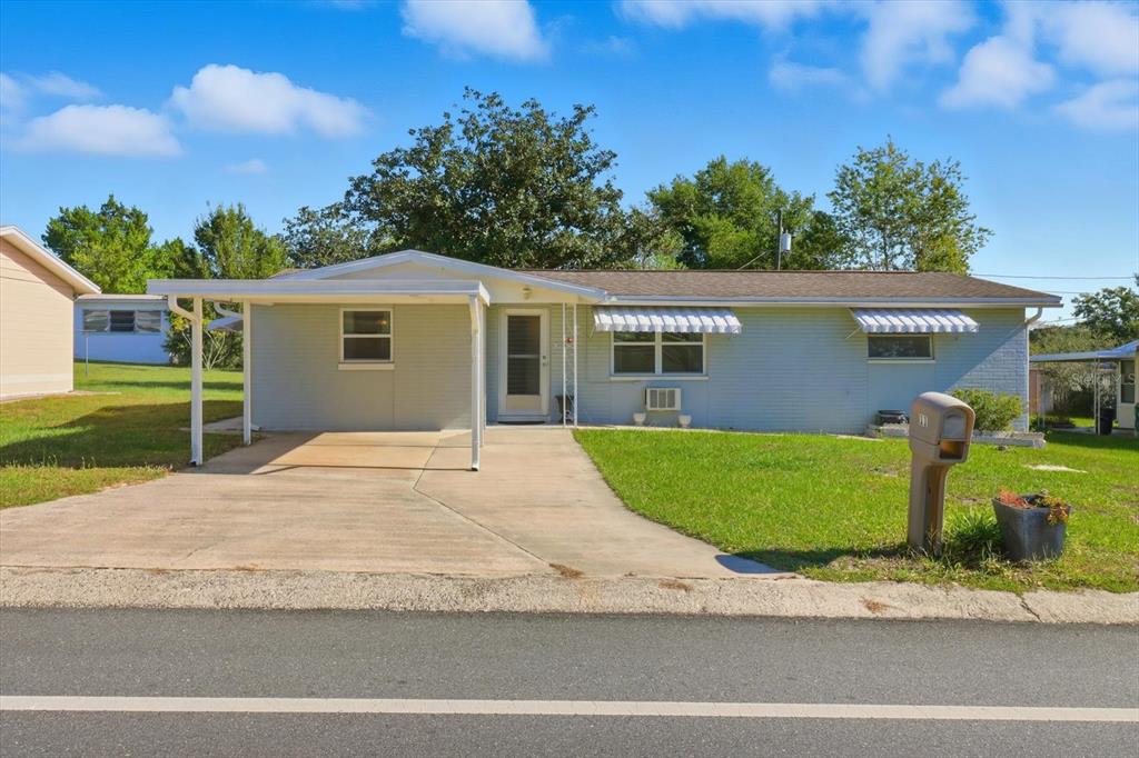 11 Roosevelt Boulevard Beverly Hills, FL 34465 - Photo 1 of 35 a view of a backyard of the house