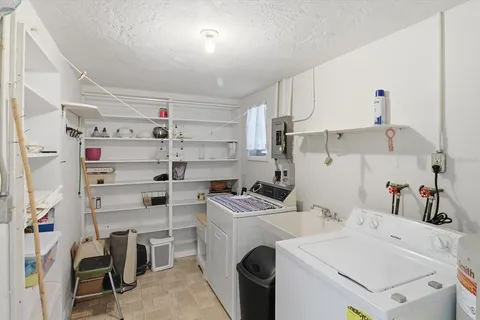 a view of kitchen and sink