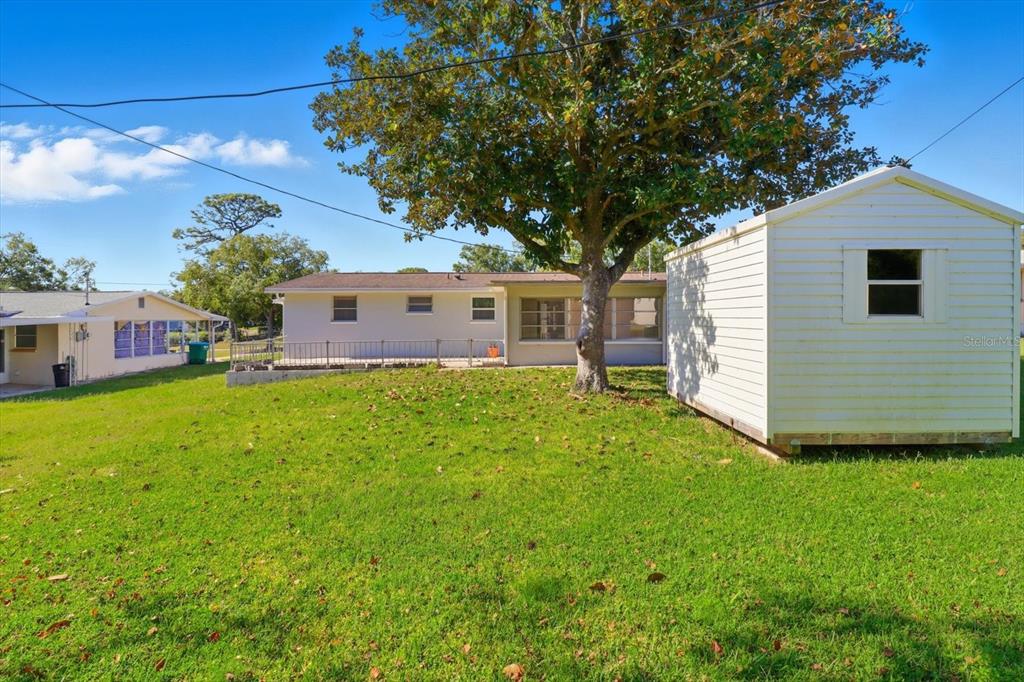 11 Roosevelt Boulevard Beverly Hills, FL 34465 - Photo 31 of 35 a front view of house with yard and green space