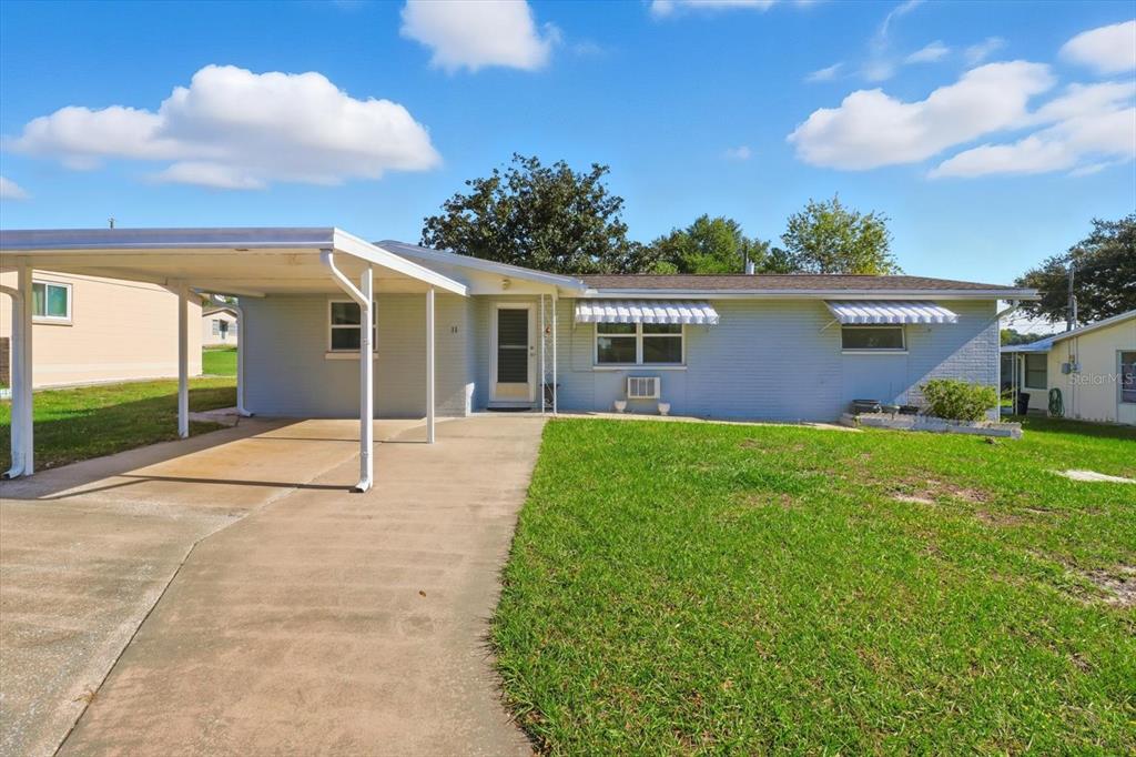11 Roosevelt Boulevard Beverly Hills, FL 34465 - Photo 33 of 35 a house view with a backyard space