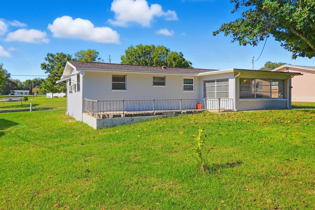 11 Roosevelt Boulevard Beverly Hills, FL 34465 - Photo 35 of 35 a view of a house with backyard and garden